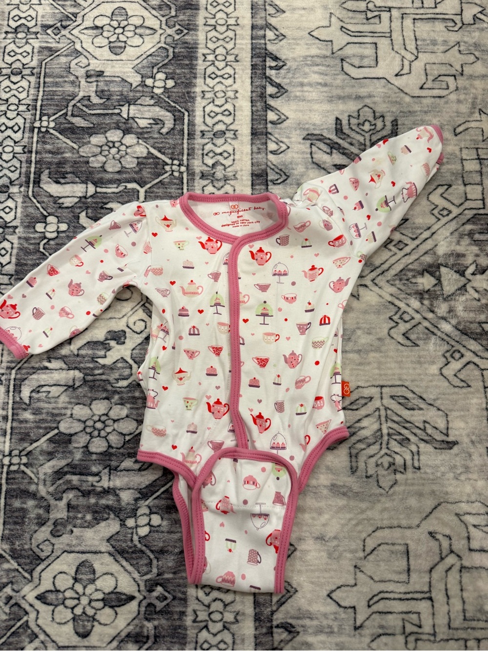 Magnificent Baby baby bodysuit with a pink teapot print-9 month